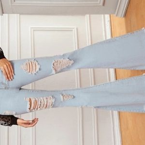Distressed bell bottom jeans